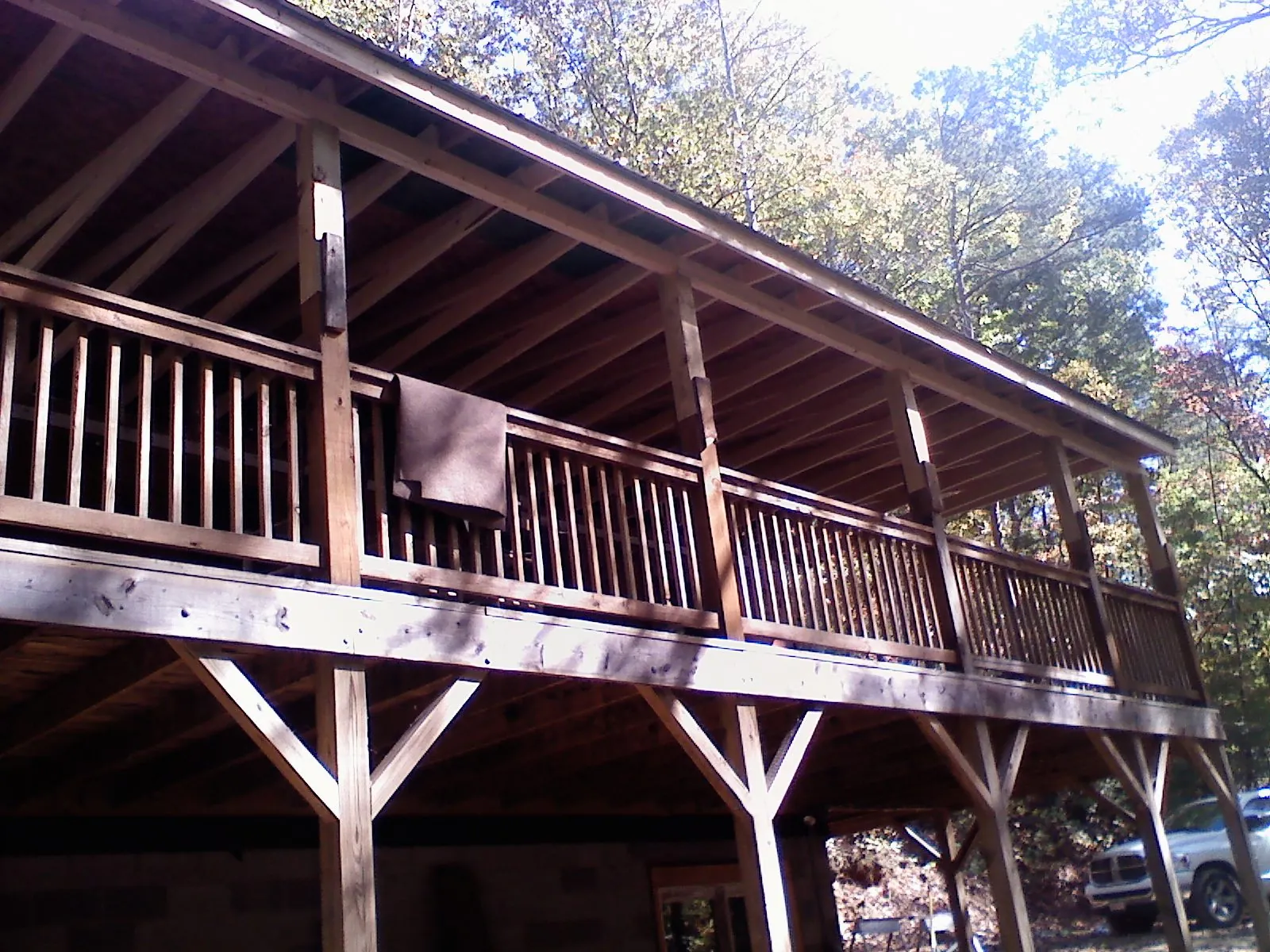 Timber framing under a new elevated porch and deck — Roof Leak Repair in Coolidge by Roofing Brothers
